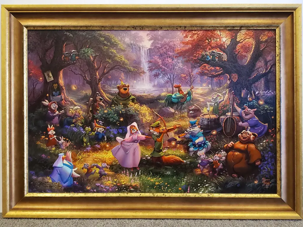 Disney character print in gold frame